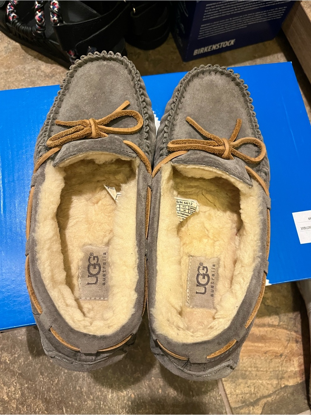 UGG women’s Grey Suede Shearling Moccasins with Chestnut Laces